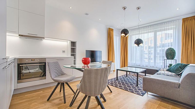 two chairs with glass table on living room.jpg